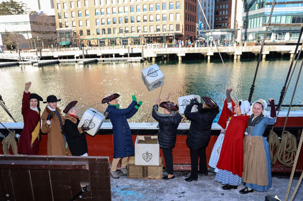 Dec 16, 2025.at Boston Tea Party Ships & Musuem. LtoR - BTP Participants Descendants Ashley Morin (White House Station, NJ), Elaine Hawkes & Nancy Smith (both Lincoln, MA), Joyce Bulger (Braintree, MA) with BTPS&M