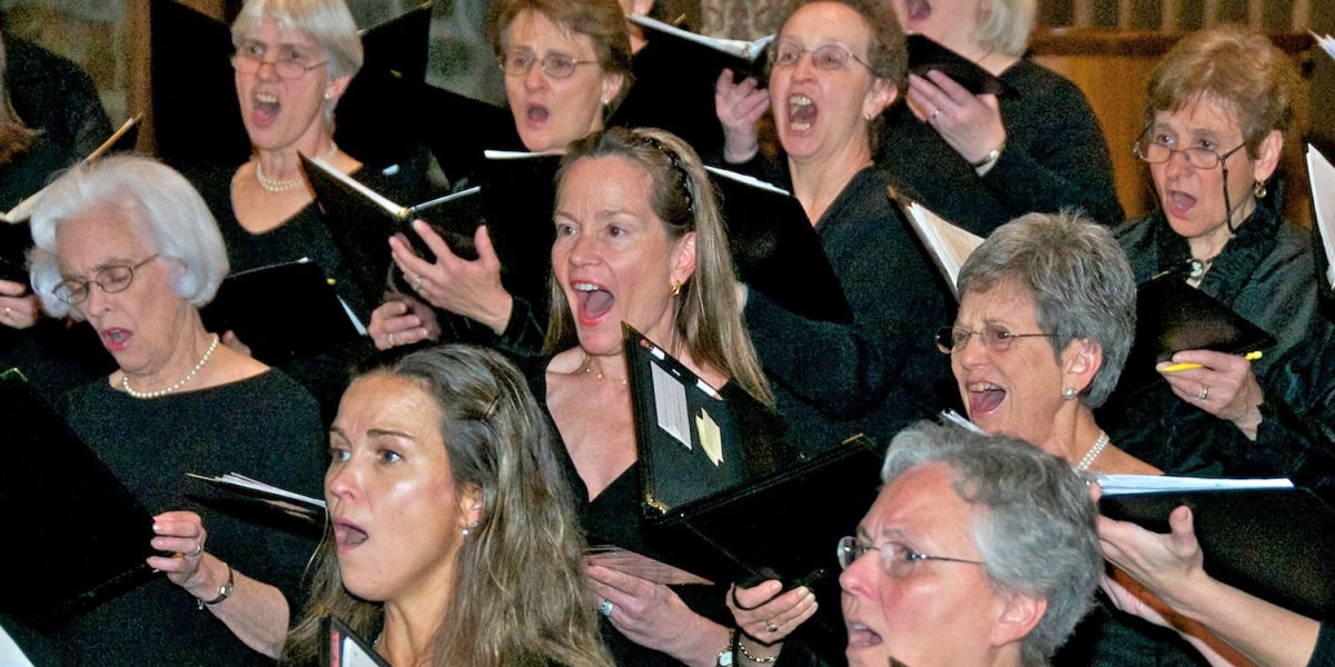Concord Women's Chorus members in concert, courtesy image