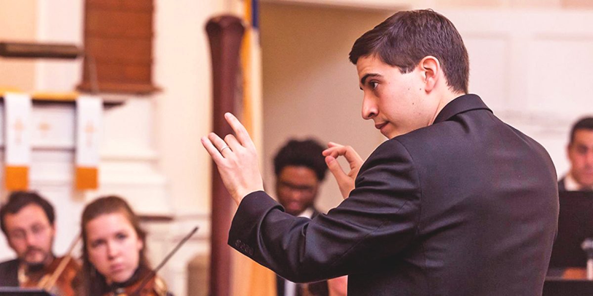 Matthew Scinto conducting CCCO 2018, by Jean Kirby Photography Cover