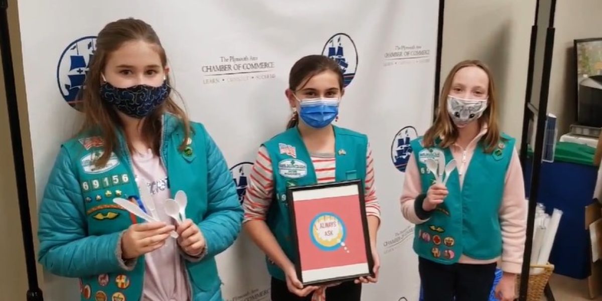 Scouts Addy Montgomery, Callie Golden and Ruby Miot of troop 69156 present their "Always Ask" idea at the Plymouth Area Chamber of Commerce.  Photo by Dave Kindy