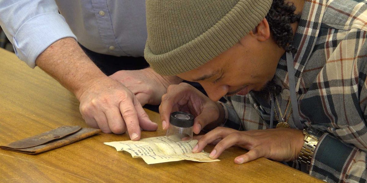 aaron-examines-the-document-699f78708134d